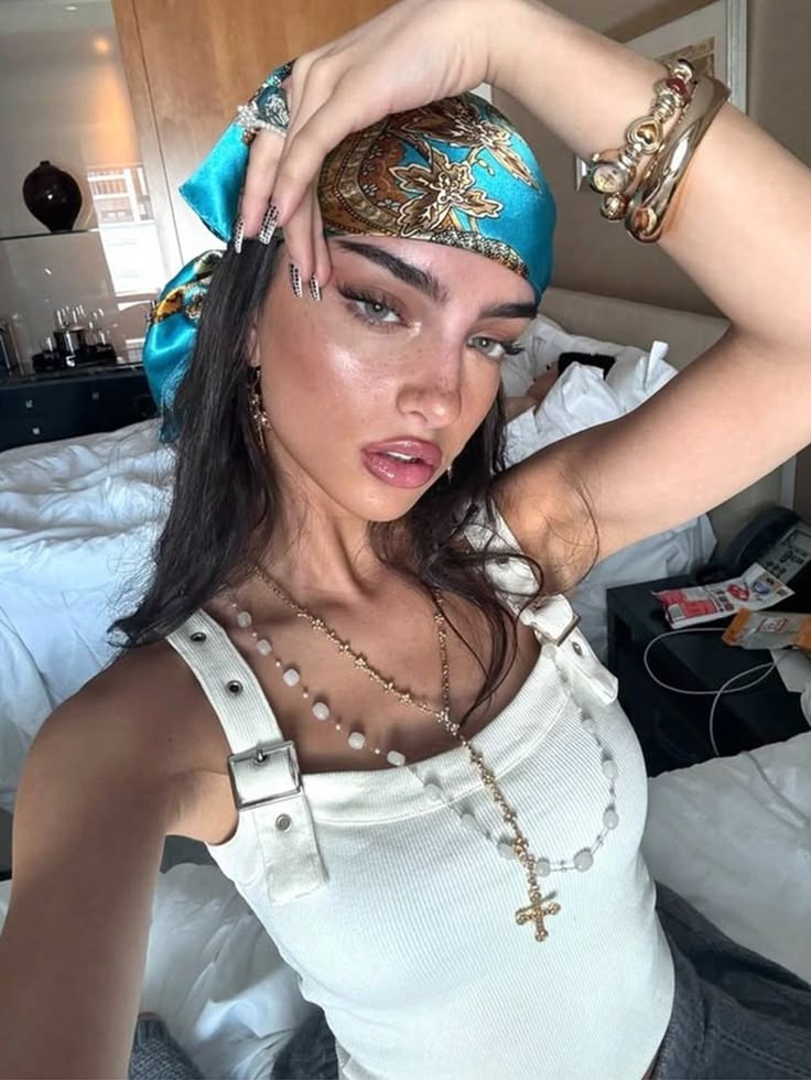 Blue printed silk headscarf, worn at home.